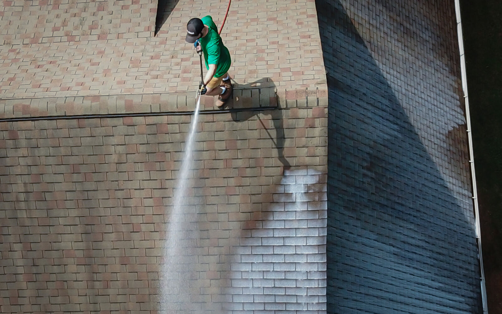 Roof cleaning in progress